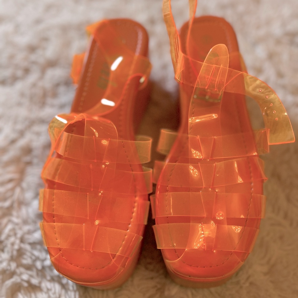 Trendy Orange jelly platform sandals.